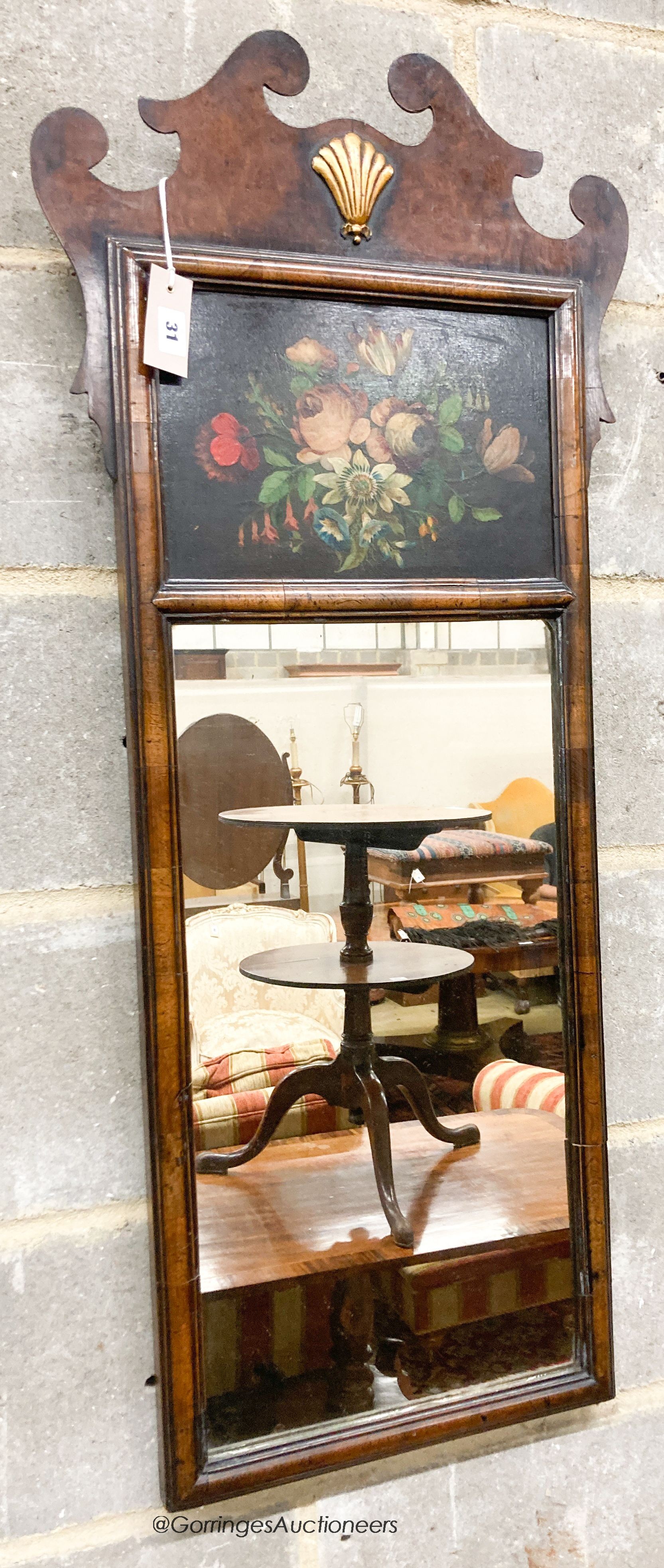 A George I style painted walnut fret cut wall mirror, width 46cm, height 107cm